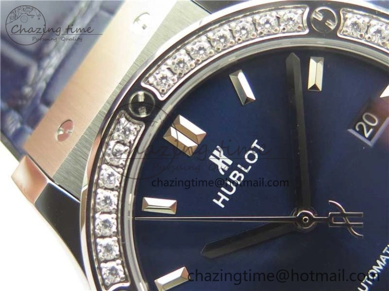 Classic Fusion 42mm SS Paved Diamonds Bezel B50F Blue Dial On Gummy Strap A2892