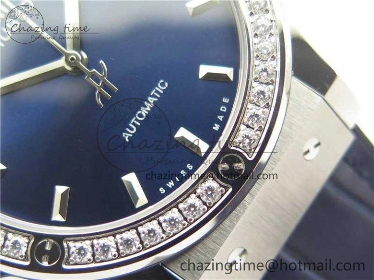 Classic Fusion 42mm SS Paved Diamonds Bezel B50F Blue Dial On Gummy Strap A2892