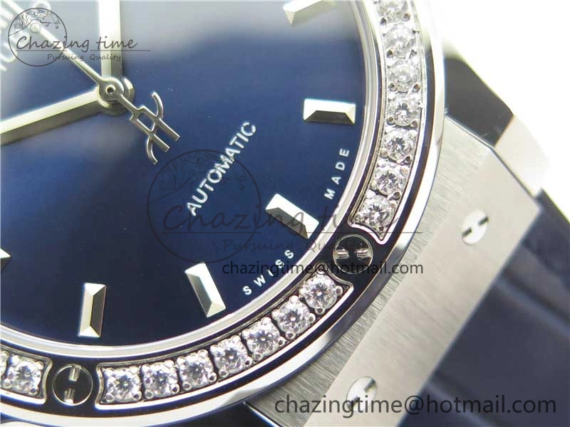 Classic Fusion 42mm SS Paved Diamonds Bezel B50F Blue Dial On Gummy Strap A2892