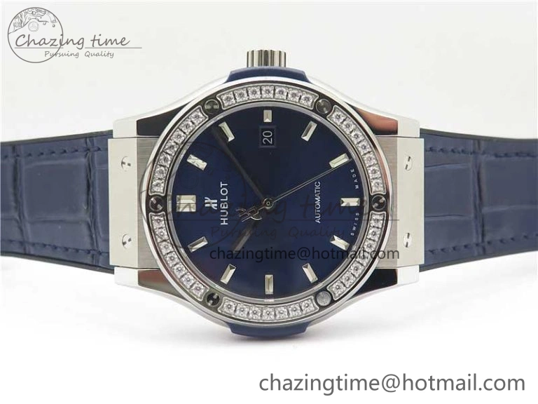 Classic Fusion 42mm SS Paved Diamonds Bezel B50F Blue Dial On Gummy Strap A2892