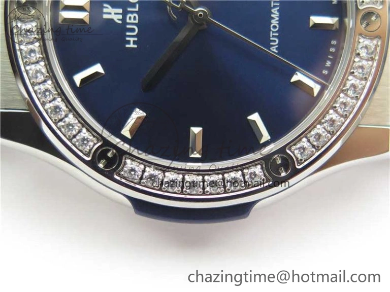 Classic Fusion 42mm SS Paved Diamonds Bezel B50F Blue Dial On Gummy Strap A2892