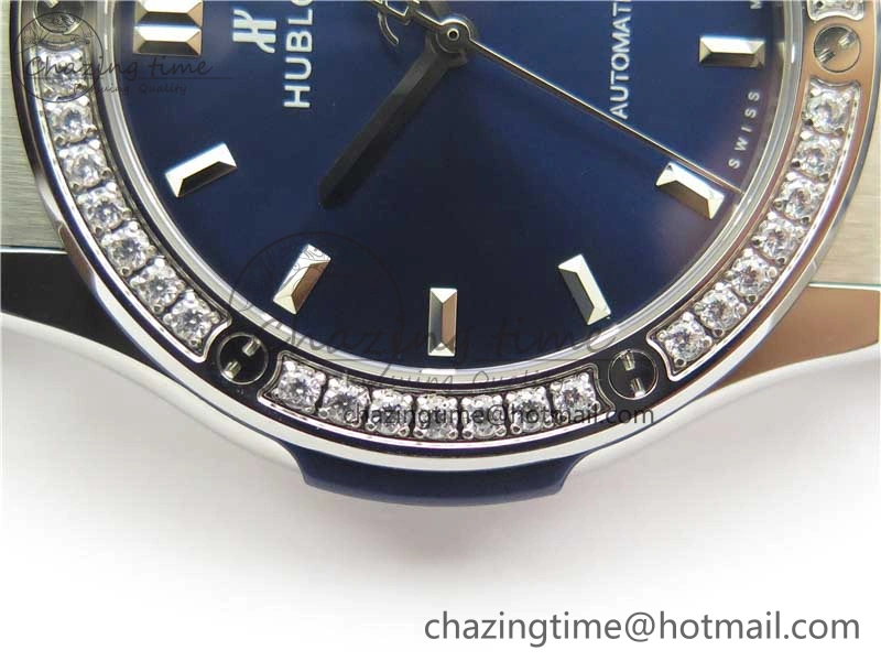 Classic Fusion 42mm SS Paved Diamonds Bezel B50F Blue Dial On Gummy Strap A2892